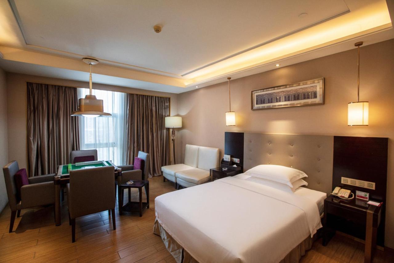 Hotel Ramada Yiyang Taojiang Exterior foto
