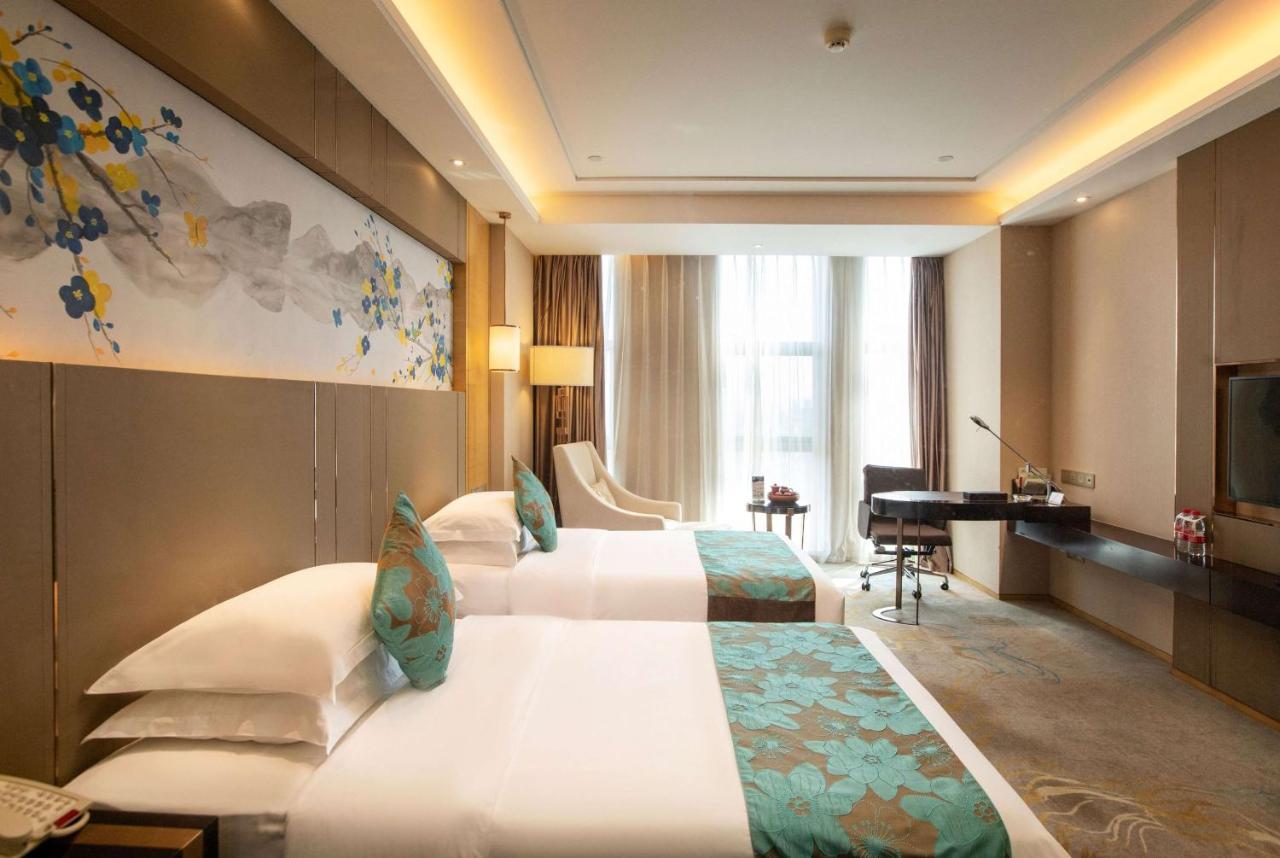 Hotel Ramada Yiyang Taojiang Exterior foto