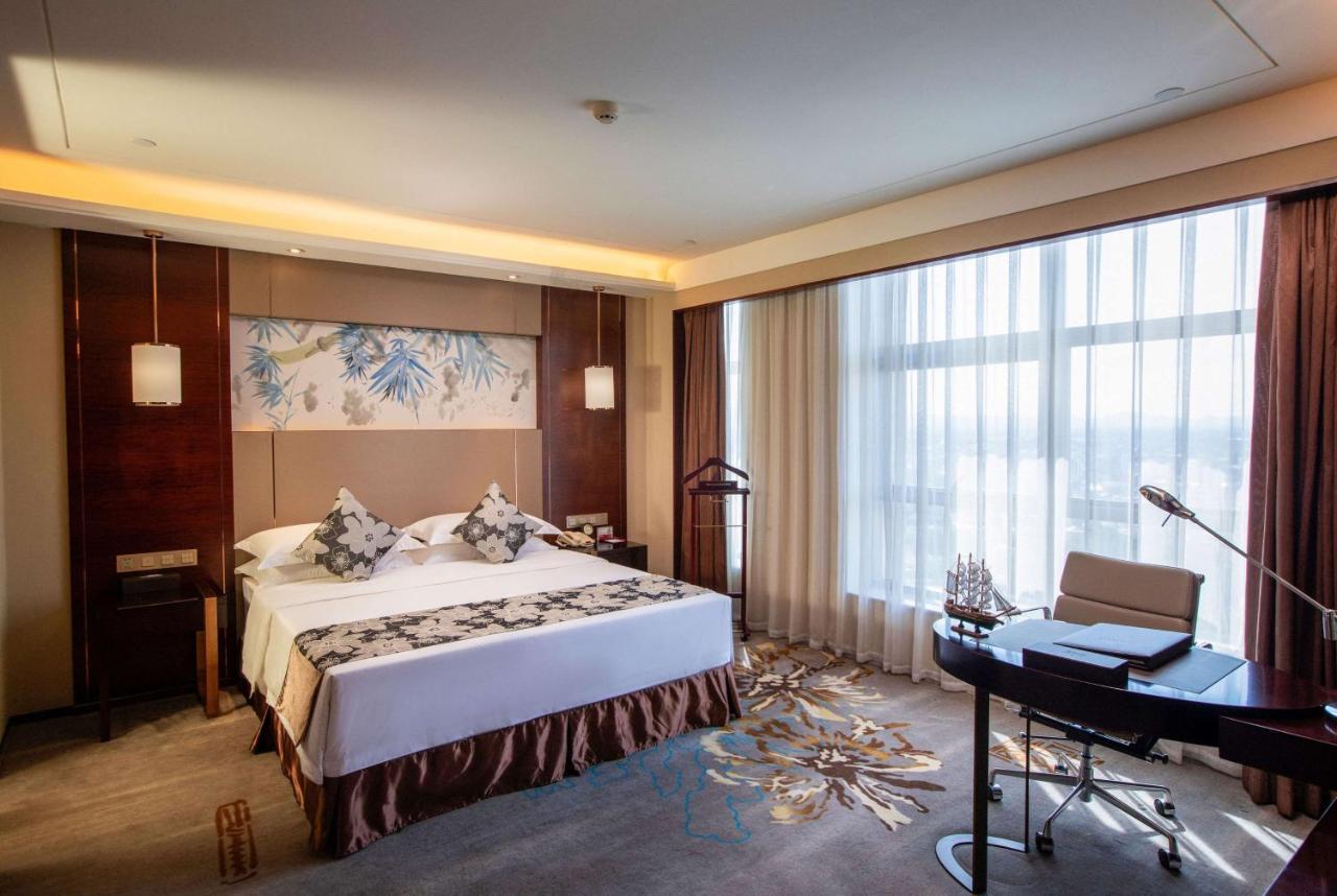 Hotel Ramada Yiyang Taojiang Exterior foto