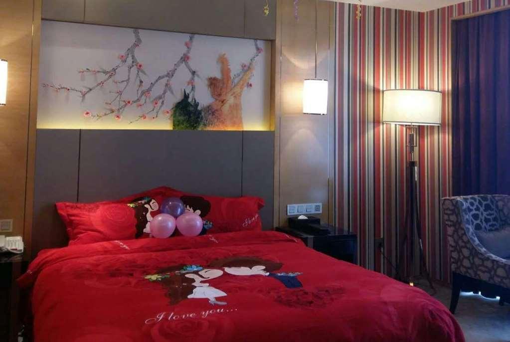 Hotel Ramada Yiyang Taojiang Habitación foto