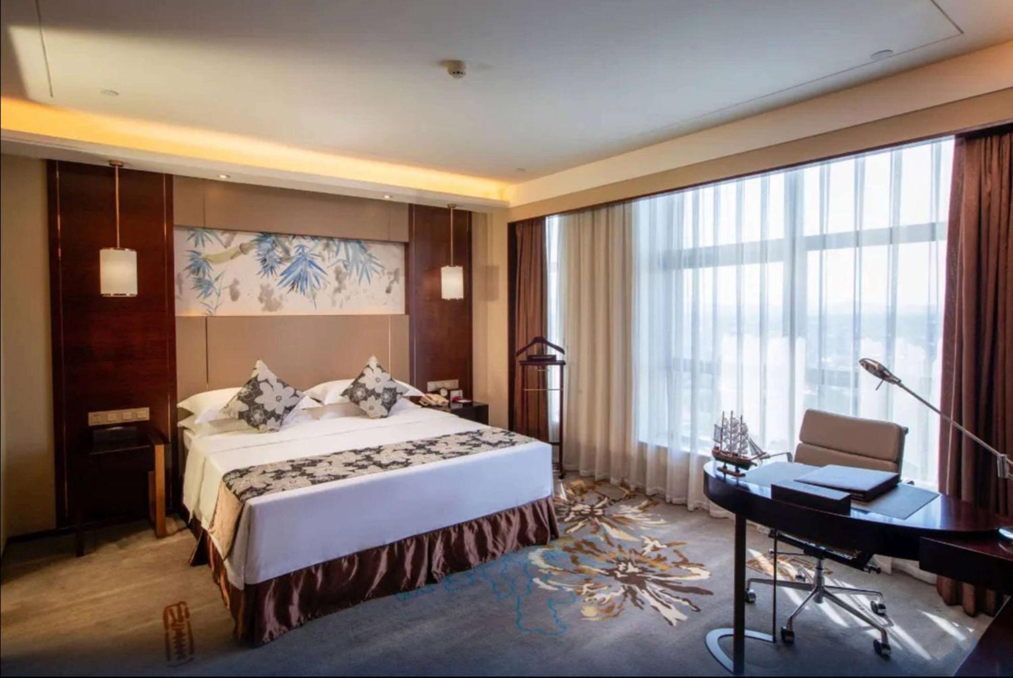 Hotel Ramada Yiyang Taojiang Exterior foto