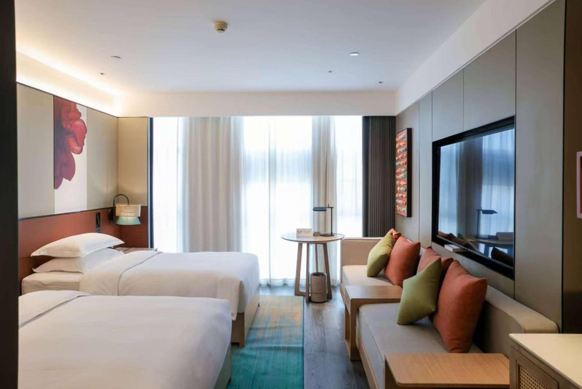 Hotel Ramada Yiyang Taojiang Exterior foto