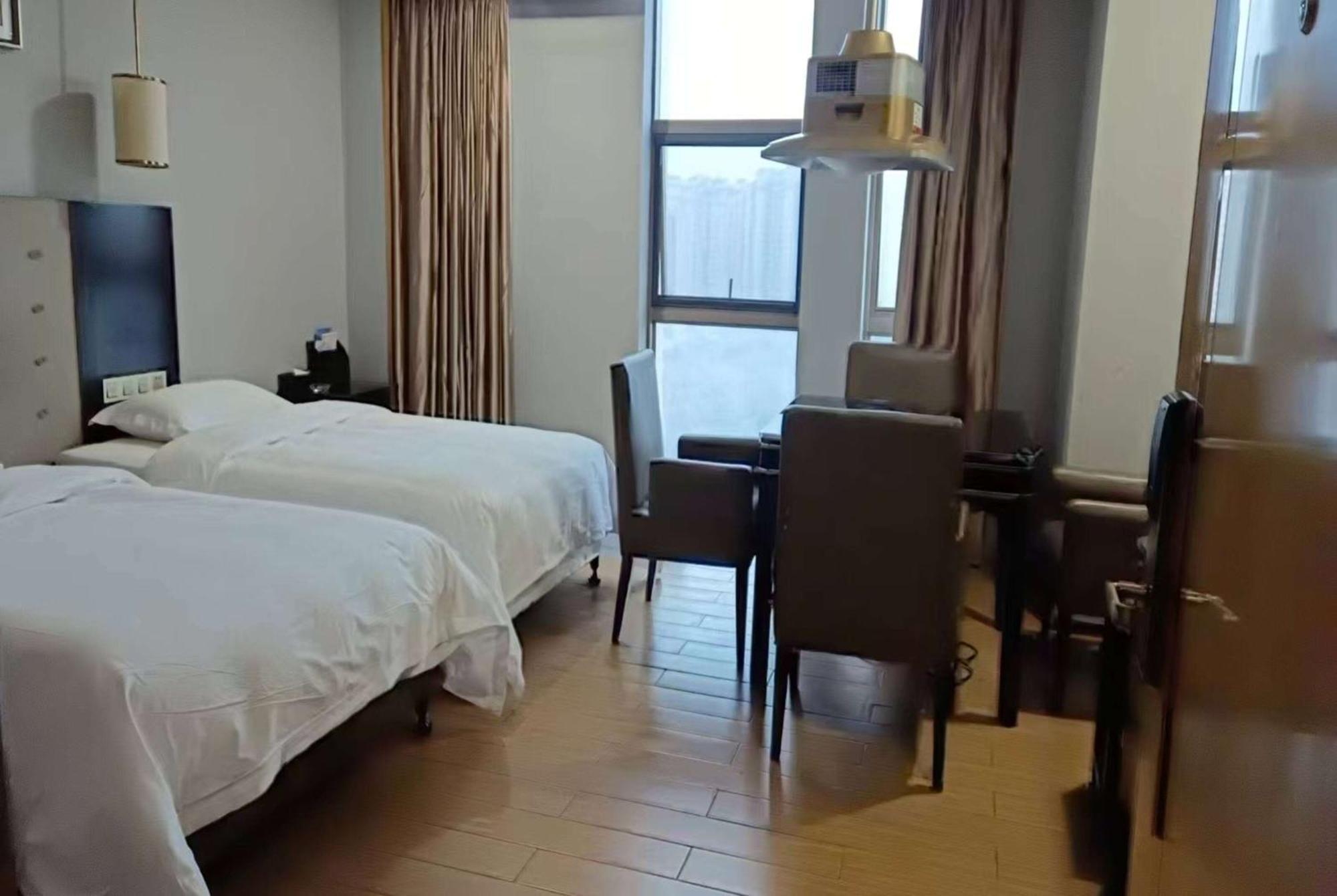 Hotel Ramada Yiyang Taojiang Exterior foto
