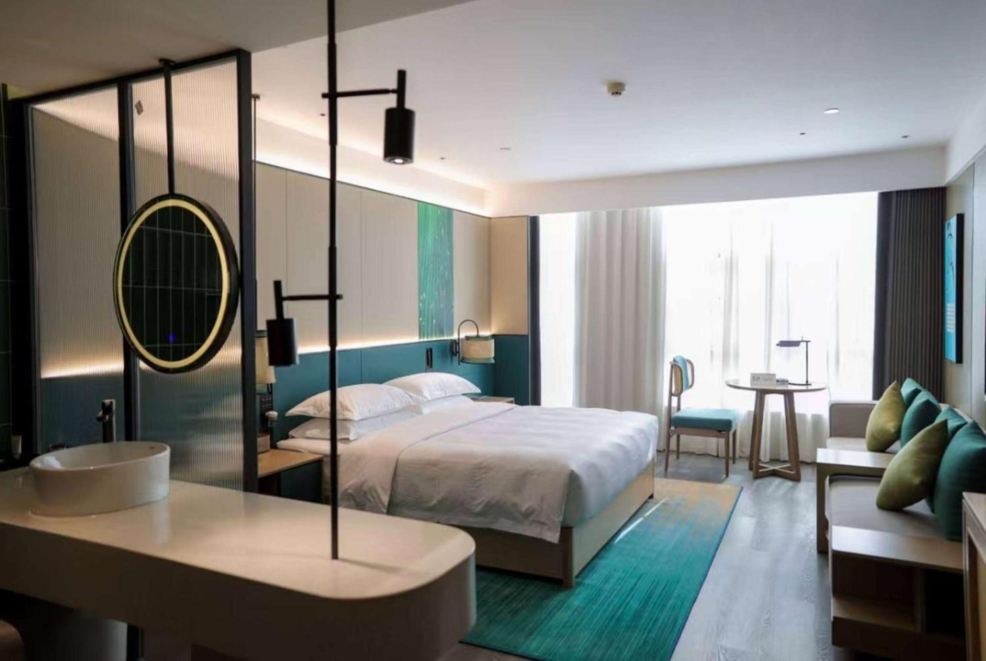 Hotel Ramada Yiyang Taojiang Exterior foto