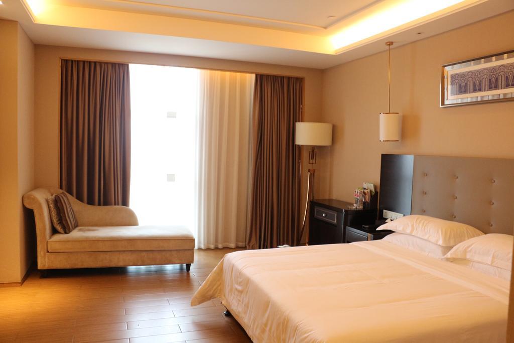 Hotel Ramada Yiyang Taojiang Exterior foto