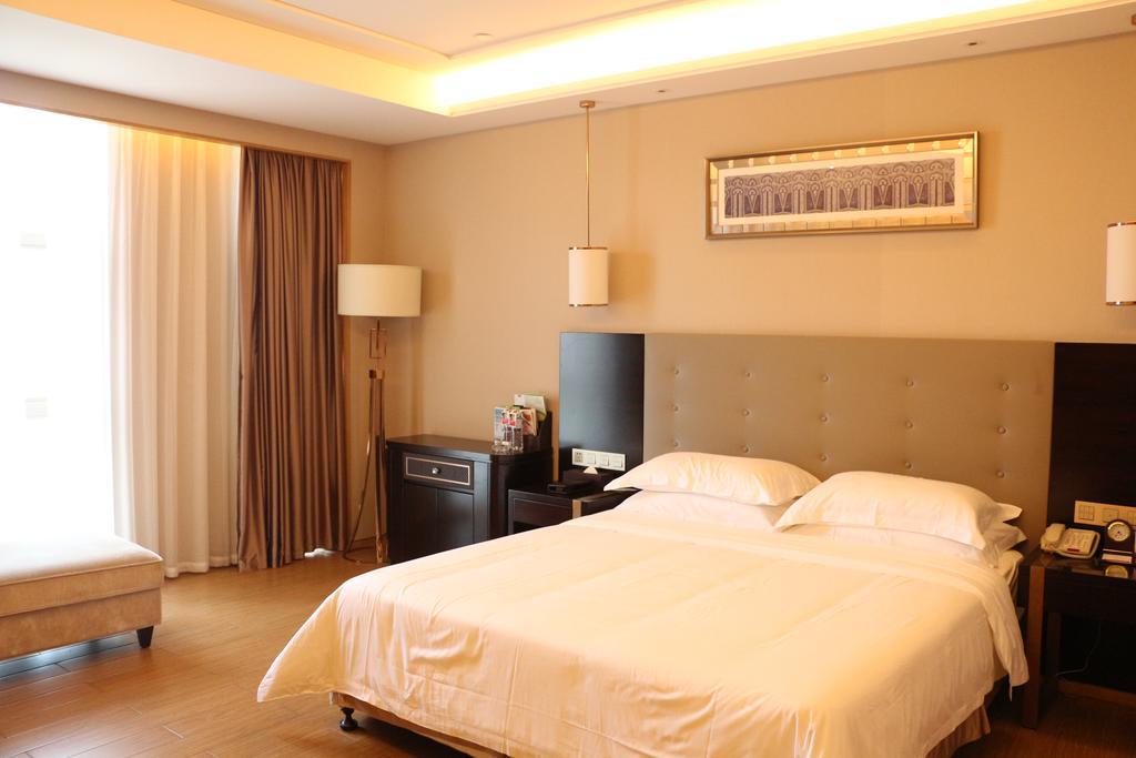 Hotel Ramada Yiyang Taojiang Exterior foto