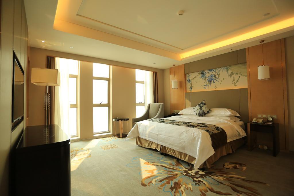 Hotel Ramada Yiyang Taojiang Exterior foto