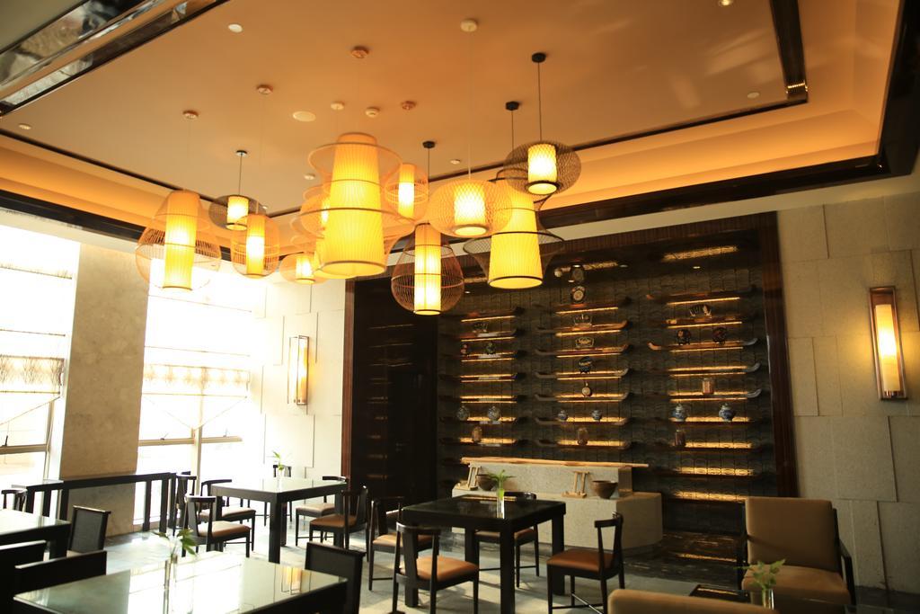 Hotel Ramada Yiyang Taojiang Exterior foto