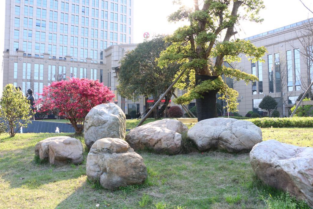 Hotel Ramada Yiyang Taojiang Exterior foto
