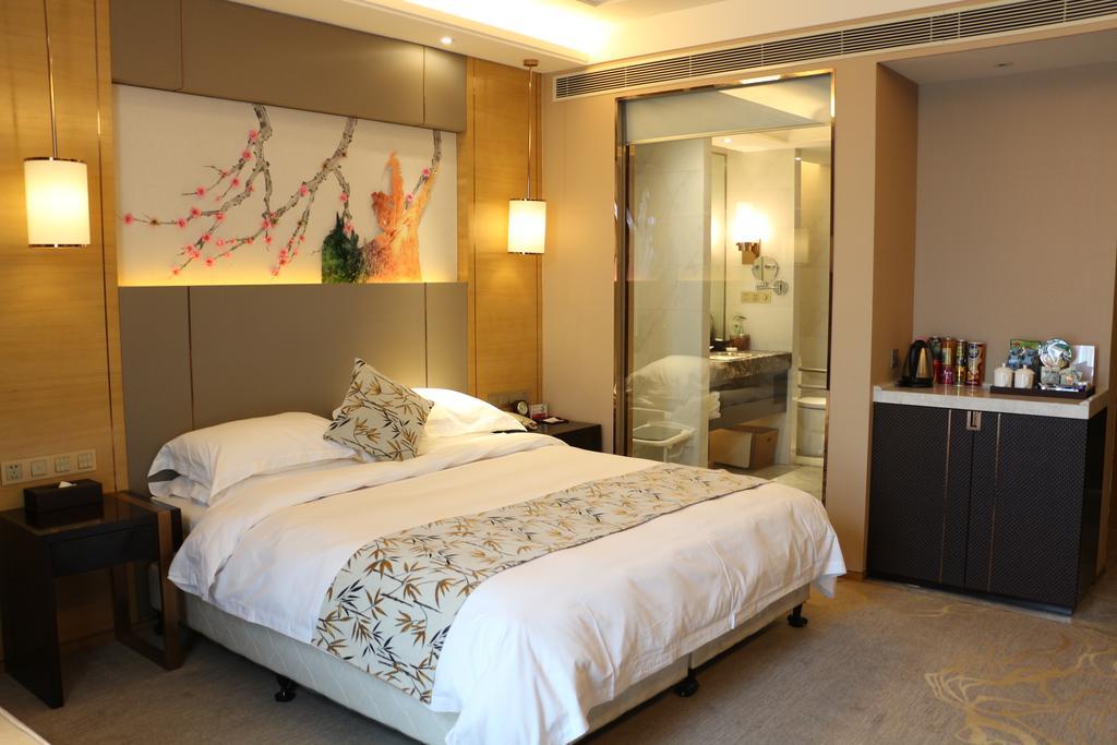 Hotel Ramada Yiyang Taojiang Exterior foto